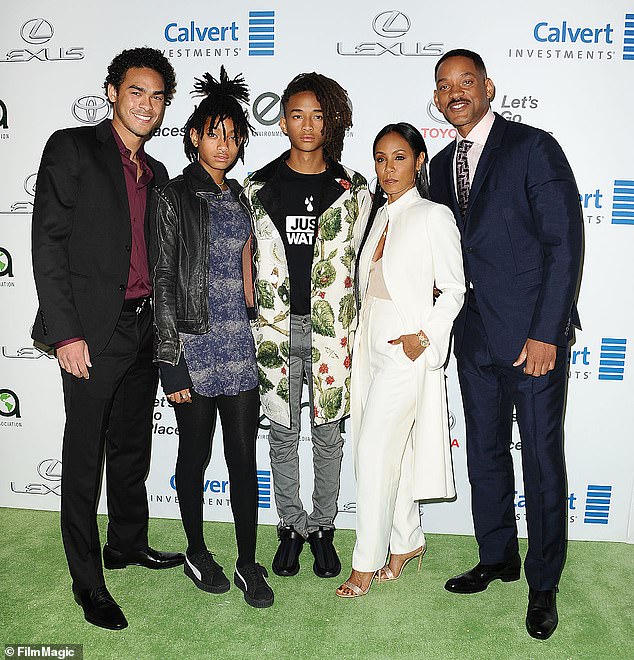 Differences: The star - who shares son Trey, now 29, with the actor, 53, - said: 'There were times we bumped our heads and it wasn't pretty';  (L-R) Trey, Willow Smith, Jaden Smith, Jada and Will, pictured in 2016