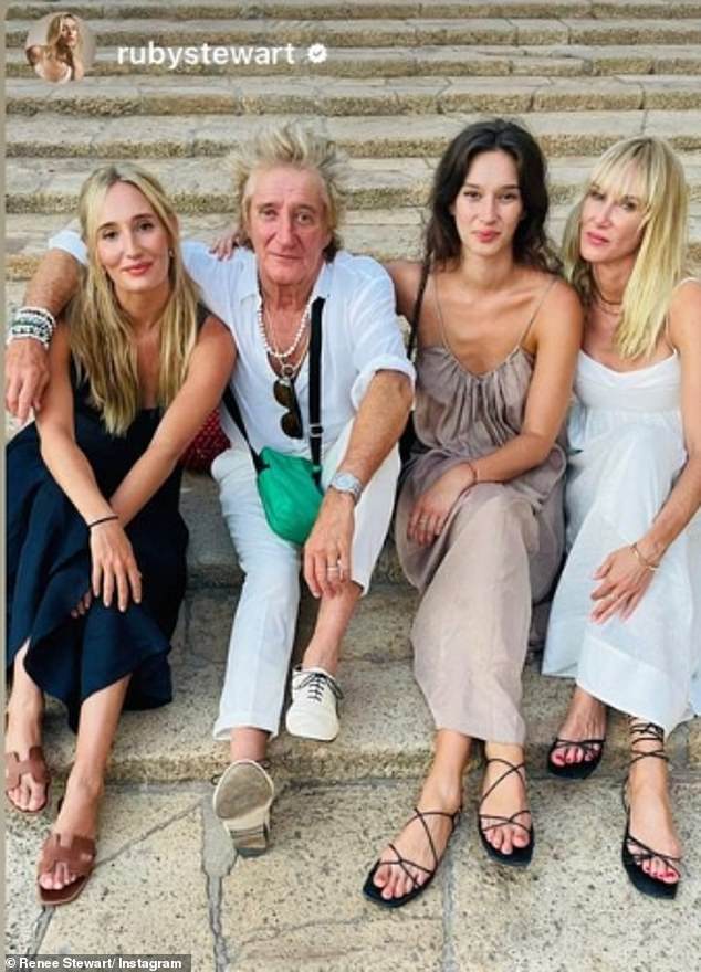 Close-up: In another snap, Rod sat with Kimberly (far left), Ruby (left) and Renee (middle) as they all wrapped their arms around him and looked at the camera