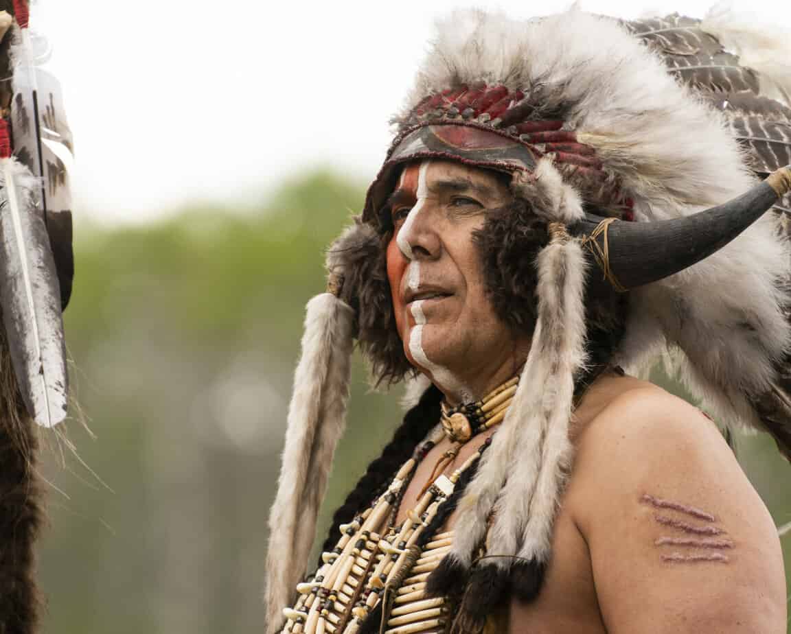 Is booty ok for teens and tweens?  Native chief looking at something not wearing a shirt and headdress. 