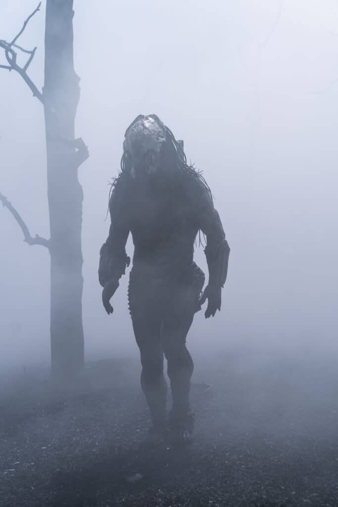 What is the age rating for Prey?  Guide for Parents.  Predator alien walking in the foggy fog.