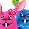 This shows pink and blue toy bunnies