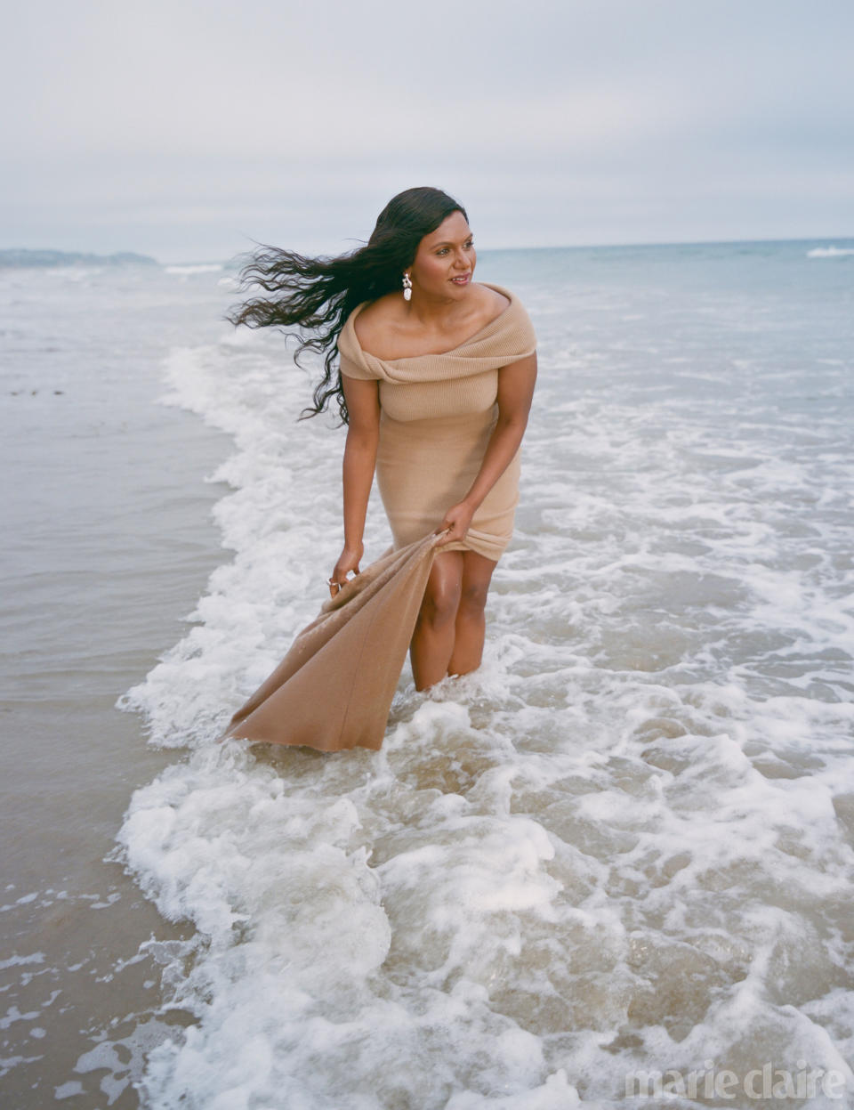 Mindy Kaling at the ocean's edge