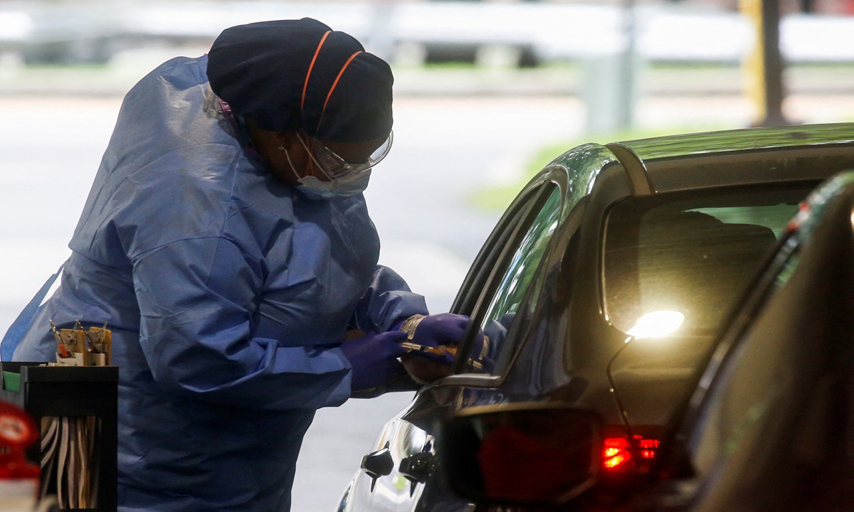 A Westchester Medical Center worker applies a monkeypox vaccine to a person at a drive-through monkeypox vaccination center on July 28, 2022 at Westchester Medical Center in Valhalla, New York, United States.  Photo: IC