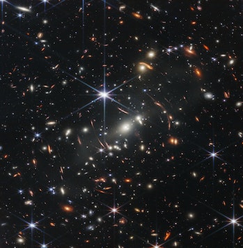 Image of hundreds or thousands of galaxies in a small area