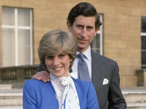 Prince Charles and Lady Diana Spencer publicly announce their engagement on February 24, 1981 at Buckingham Palace.