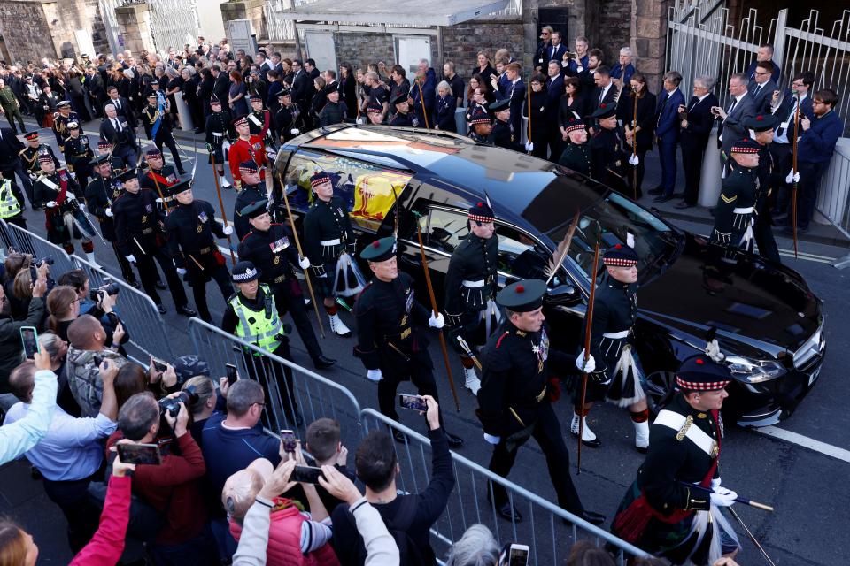 Britain's King Charles III (L), flanked by Britain's Princess Anne, Princess Royal, Britain's Prince Andrew, Duke of York and Britain's Prince Edward, Earl of Wessex, walk behind the procession of Queen Elizabeth II's coffin from Holyroodhouse Palace to St Giles Cathedral, on the Royal Mile on September 12, 2022, where Queen Elizabeth II will come to rest.  - Mourners will get their first opportunity to pay their respects to Queen Elizabeth II's coffin on Monday, as it lies in an Edinburgh cathedral where King Charles III.  will lead a vigil.  (Photo by Odd ANDERSEN/POOL/AFP) (Photo by ODD ANDERSEN/POOL/AFP via Getty Images)