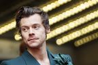 Harry Styles photographed the red carpet at the Princess of Wales Theater for the film 