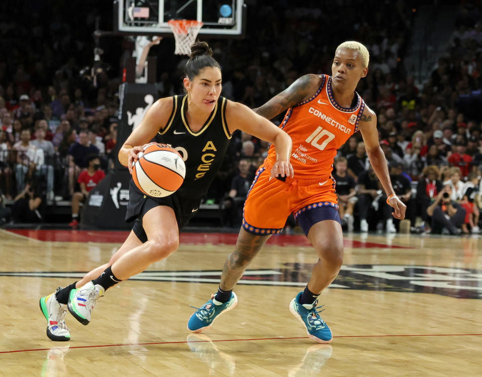 Las Vegas Aces Guard Kelsey Plum drives against Connecticut Sun Guard Courtney Williams in Game 2 of the 2022 WNBA Finals at the Michelob ULTRA Arena on September 13, 2022 in Las Vegas.  (Ethan Miller/Getty Images)