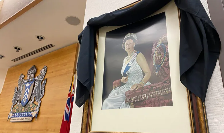 A portrait of the Queen hangs in the Sault Ste.  Marie council chambers, draped with a black cloth. 