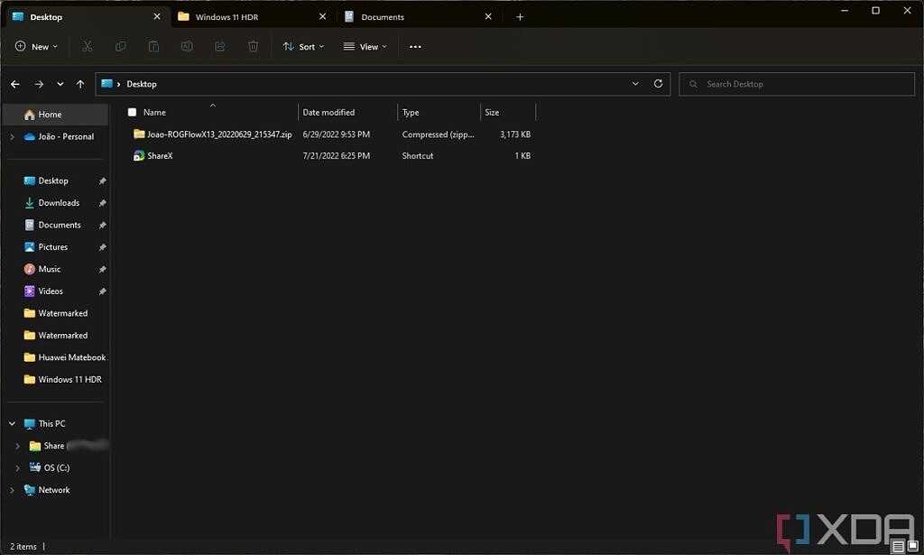 Screenshot of File Explorer in Windows 11 showing three tabs at the top of the window