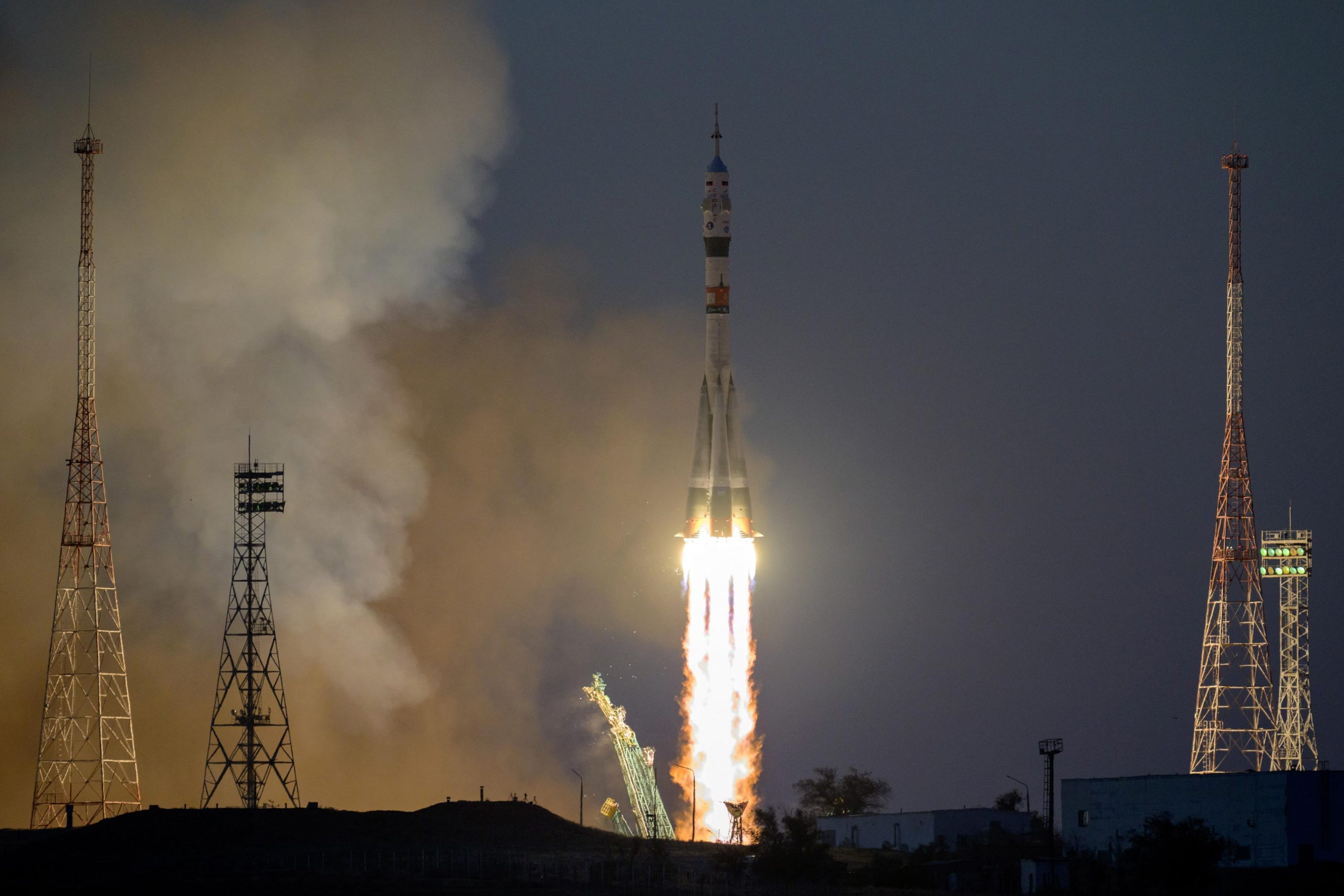 NASA astronaut Frank Rubio (left), Roscosmos cosmonaut Sergey Prokopyev (center) and Roscosmos cosmonaut Dmitri Petelin