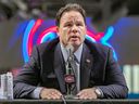 Montreal Canadiens executive vice president of hockey operations Jeff Gorton answers a question during a news conference introducing Kent Hughes as the team's general manager January 19, 2022 at the Bell Center.