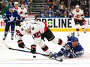 Ottawa Senators forward Tyler Motte (14) pulls clear of Toronto Maple Leafs forward Auston Matthews (34) before scoring in the third half at Scotiabank Arena.