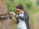 Katie Harris, a graduate student at the University of Saskatchewan, at one of her project's game viewing sites in Saskatoon.