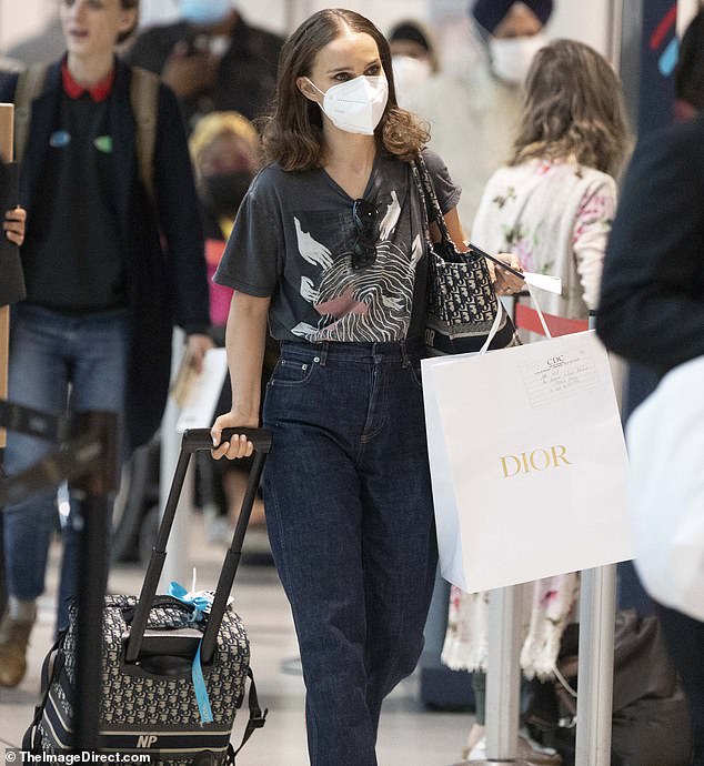 Beautiful: Natalie Portman, 41, was photographed at a Toronto airport on Monday after attending the city's prestigious film festival