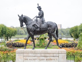 Queen Elizabeth II rides her favorite horse, a Saskatchewan-born black mare named Burmese, a gift from the Royal Canadian Mounted Police in 1969.  The piece was sculpted by Saskatchewan artist Susan Velder