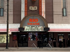 Security guards were seen outside the Rio Theater on Wednesday night as people queued for the screening of the controversial film Deep Throat.