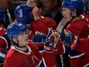 Cole Caufield of the Candiens celebrates with his teammates after scoring against the Ottawa Senators during the NHL preseason game at Bell Center October 4, 2022.