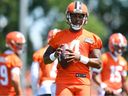 Deshaun Watson of the Cleveland Browns conducts a drill during Cleveland Browns training camp at the CrossCountry Mortgage Campus July 30, 2022 in Berea, Ohio.