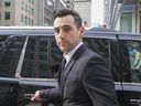 Hedley frontman Jacob Hoggard exits 361 University Ave.  Toronto Courts, May 6, 2022.