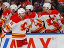 10/15/2022;  Edmonton, Alberta, CAN;  The Calgary Flames celebrate a goal by forward Name Kadri (91) in the first half against the Edmonton Oilers at Rogers Place. 