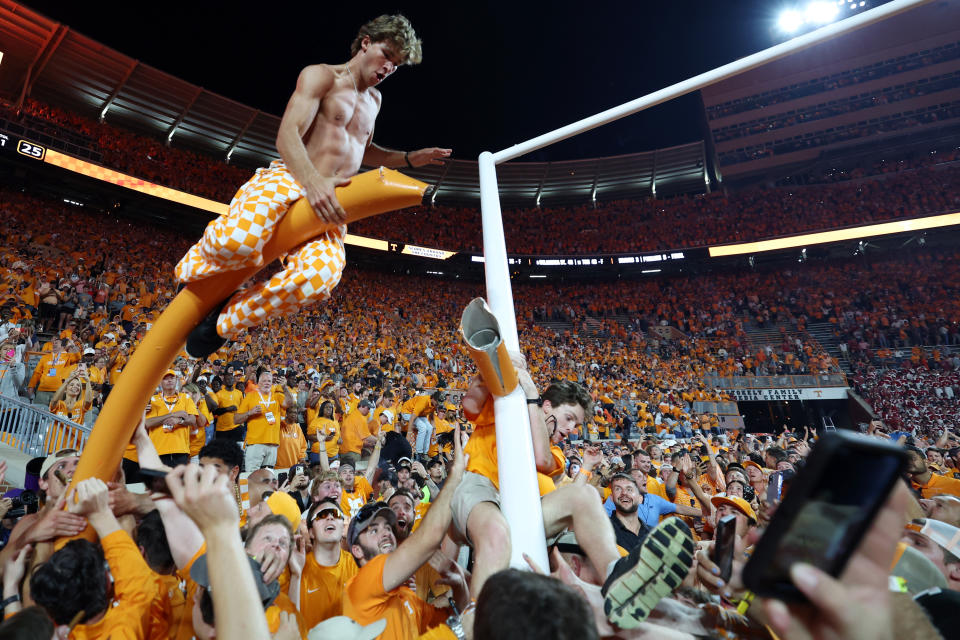 Tennessee fans tear down the goalpost after Tennessee defeated Alabama 52-49 on October 15, 2022 at Neyland Stadium in Knoxville, Tennessee.  (Photo by Donald Page/Getty Images)