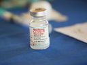 A vial of the Moderna COVID-19 vaccine lies on a table at a immunization facility adjacent to Jackson State University in Jackson, Mississippi, Tuesday, July 19, 2022.