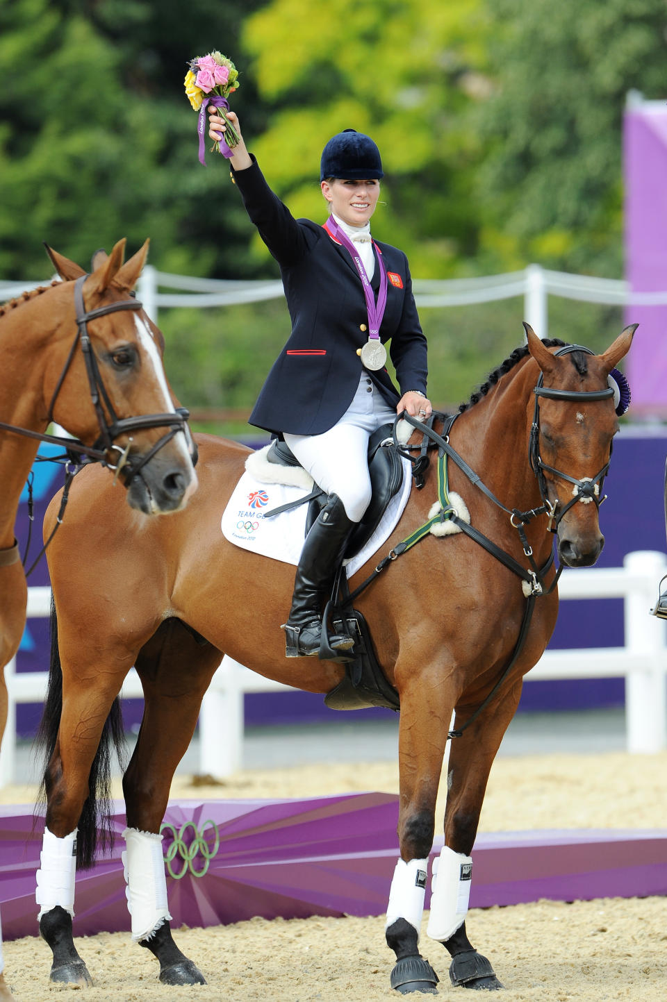 LONDON, ENGLAND - JULY 31: Zara Phillips riding High Kingdom waves to the crowd after winning a silver medal after the Eventing Team Jumping Final Equestrian Event on Day 4 of the London 2012 Olympic Games at Greenwich Park on July 31 2012 in London, England.  (Photo by Pascal Le Segretain/Getty Images)