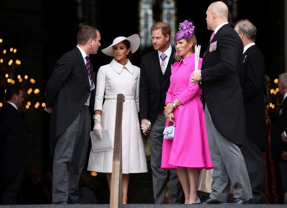 LONDON, ENGLAND - JUNE 03: (LR) Peter Phillips, Meghan, Duchess of Sussex, Prince Harry, Duke of Sussex, Zara Tindall and her husband Mike Tindall depart after the National Service of Thanksgiving to mark Her Majesty's Platinum Jubilee Celebrating the Queen at St. Paul's Cathedral on June 3, 2022 in London, England.  Elizabeth II's Platinum Jubilee will be celebrated from 2-5 June 2022 in the UK and Commonwealth to celebrate the 70th anniversary of Queen Elizabeth II's accession to the throne on 6 February 1952.  (Photo by Victoria Jones - WPA Pool/Getty Images)