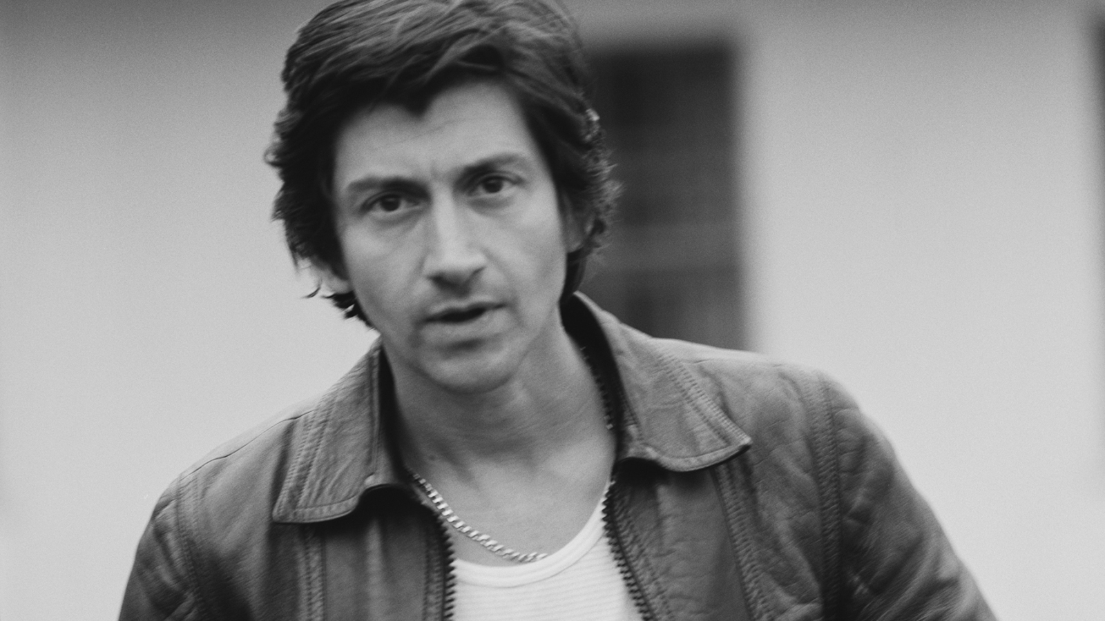 Alex Turner knows you want Arctic Monkeys to do AM again.  We're sorry!