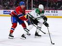 Dallas Stars defenseman Jani Hakanpaa (2) controls the puck against the Canadians' Jake Evans (71) at the Bell Center in Montreal on Saturday, October 22, 2022. 