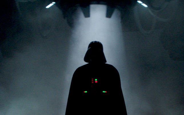 The distinctive silhouette of the black-clad, helmeted villain Darth Vader in Obi-Wan Kenobi on Disney Plus.