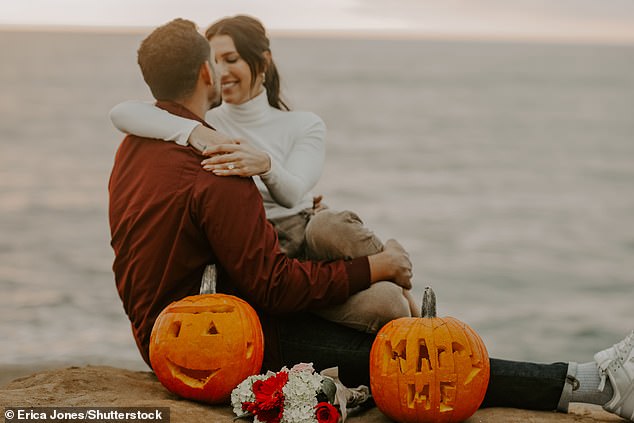 Isn't that something?  It appears that the duo went to the beach to carve pumpkins, then Thomas carved the words 