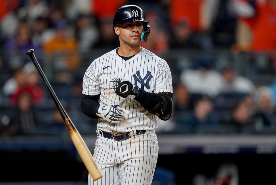 New York Yankees Gleyber Torres throws his bat after batting against the Houston Astros to end the seventh inning of Game 4 of an American League Championship baseball series on Sunday, October 23, 2022 in New York.  (AP Photo/John Minchillo)