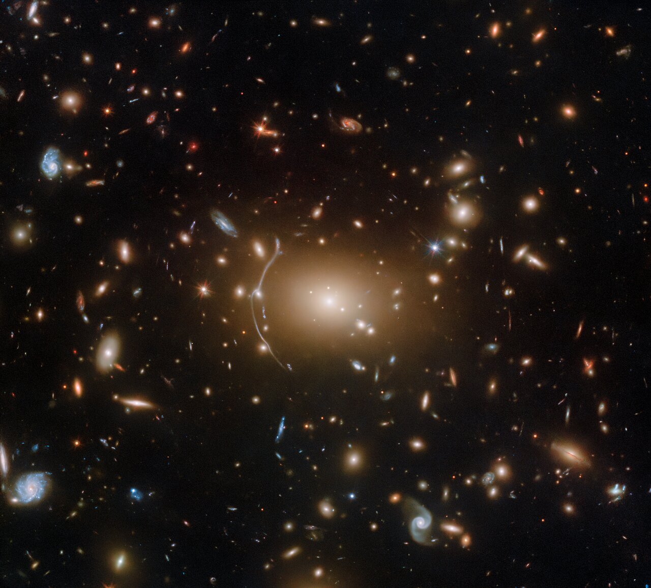 Hubble celebrates spooky season with Abell 611, a spider web of galaxies bound together by a dark secret