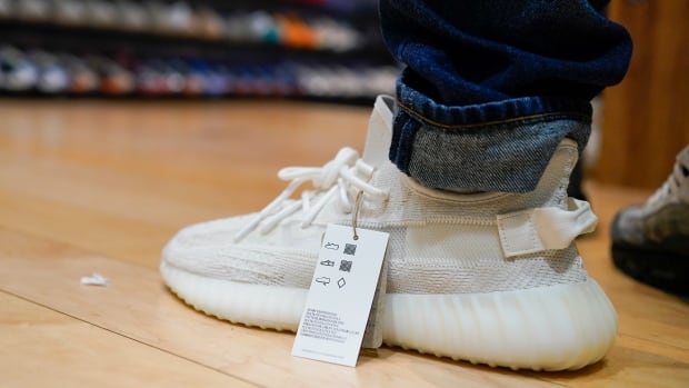 Yes or no?  Yeezy sneaker sales soar as fans and businesses split to give boot to Kanye West |  CBC News