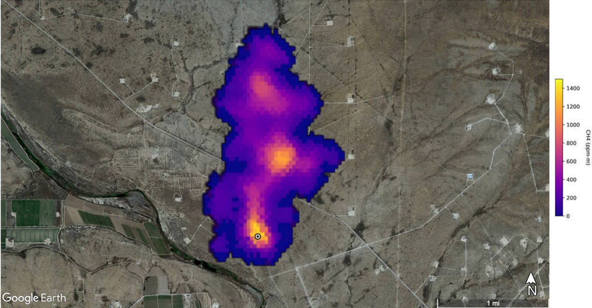 On a Google Maps screen, a purple, yellow, and orange blob represents where methane was detected near Carlsbad, New Mexico.