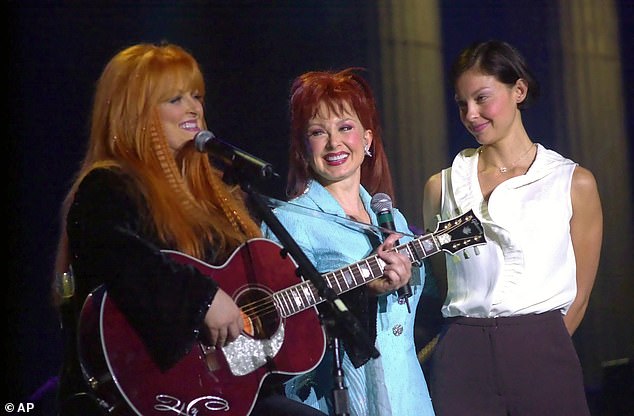 Happier times: Naomi Judd died at her home in Tennessee on April 30 at the age of 76 from a self-inflicted gunshot wound;  seen with mother Naomi and sister Wynonna on January 19, 2002 in Kentucky