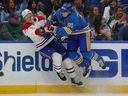 St. Louis Blues' Vladimir Tarasenko (91) checks Canadiens' Kaiden Guhle during first period play at the Enterprise Center on Saturday, October 29, 2022 in St. Louis.