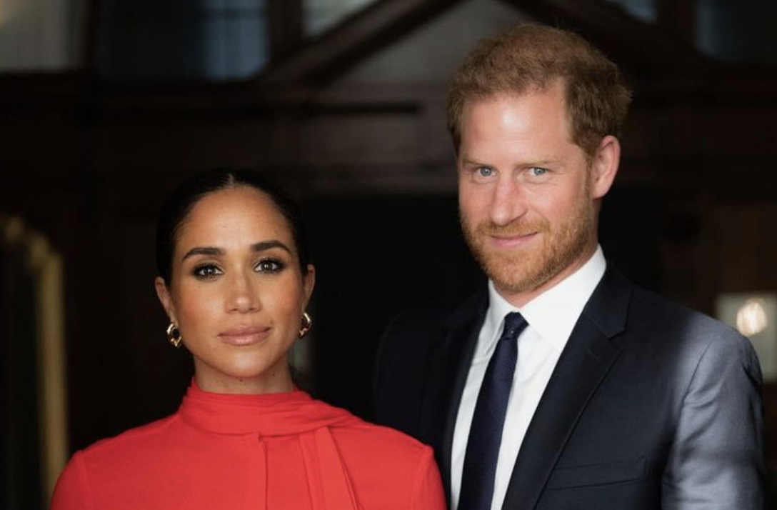 Meghan Markle and Prince Harry hold hands in new photos taken three days before Queen Elizabeth II's death