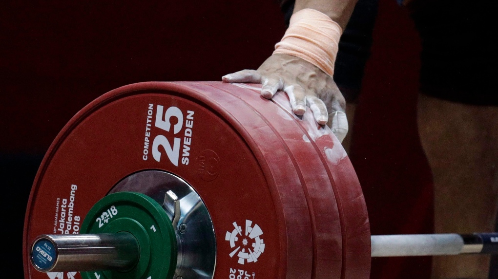 Nazi weightlifting coach charged with sexually assaulting teenagers after multiple complaints