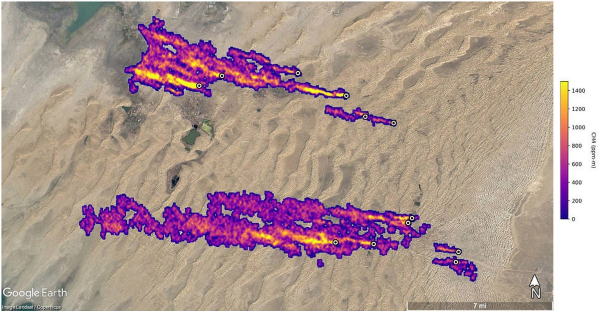 On a Google Maps screen, a purple, yellow, and orange blob represents where methane was detected in Turkmenistan