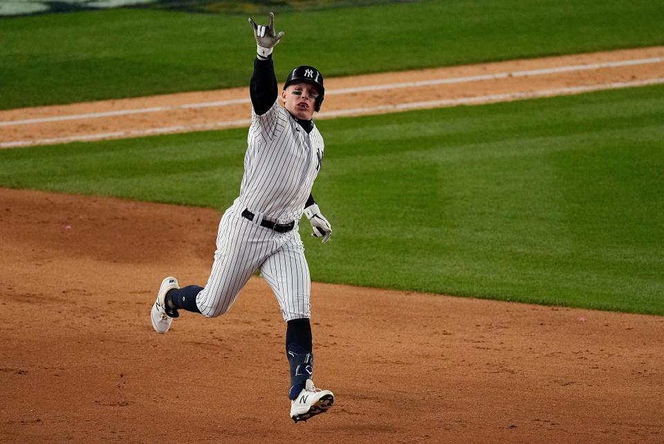 Harrison Bader of the New York Yankees reacts as he circles the bases after hitting a solo home run against the Houston Astros during the sixth inning of Game 4 of an American League Championship baseball series Sunday, October 23, 2022 in New York has hit.  (AP Photo/Julia Nikhinson)