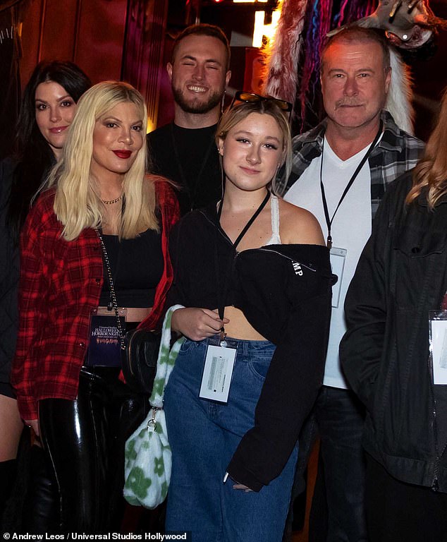 Back together: Tori Spelling and Dean McDermott made a very rare sighting together at a public event.  The couple posed for a picture with their children as they took on the Hollywood Horror Nights at Universal Studios in Los Angeles on Thursday